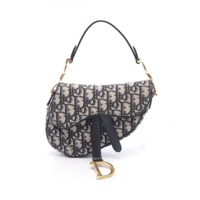 Dior Handbag Saddle Oblique Ivory Navy Canvas Leather Bag Mini in White Canvas from The Reluxe, photo 1 of 1