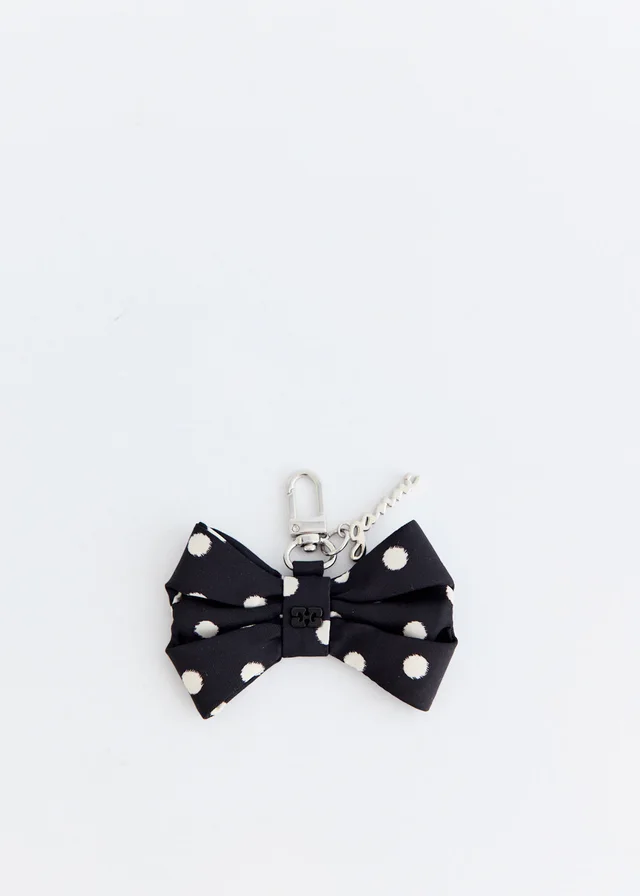 Ganni Bow Charm in Black, image 1 of 1 from Incu