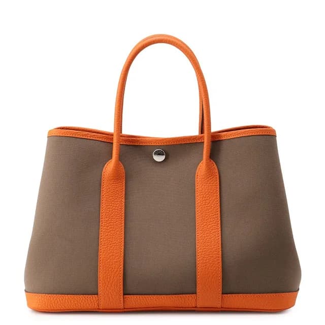 Hermès Tote Bag Garden Party TPM Etoupe Orange Silver Toile Officier Negonda in Taupe from The Reluxe, photo 1 of 1