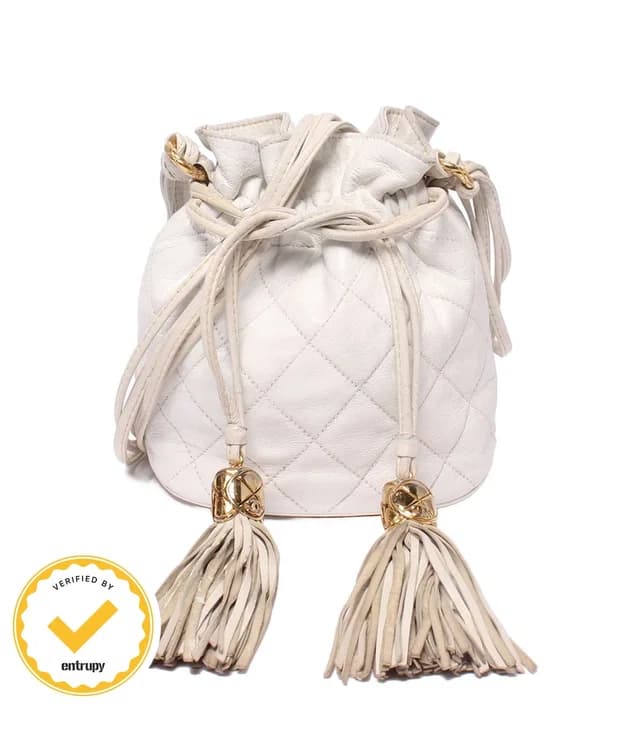 Chanel Shoulder Bag Crossbody Gold Drawstring Quilted in Gold from The Reluxe, photo 1 of 1