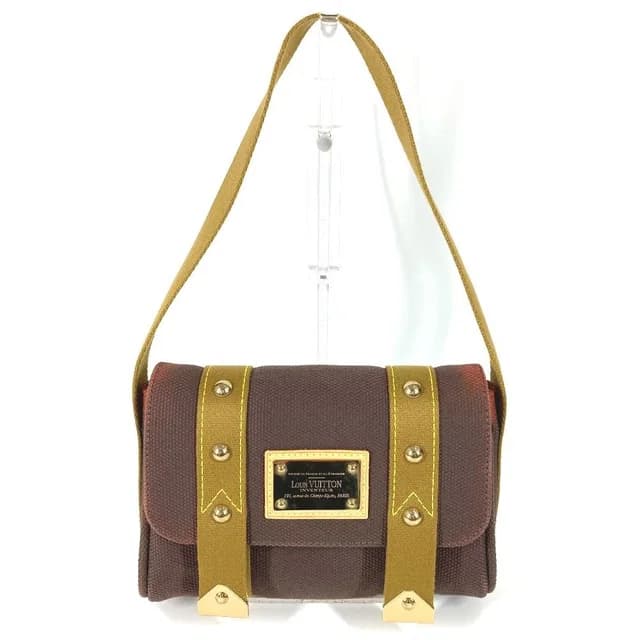 Louis Vuitton Shoulder Bag Sac Mule Canvas Brown in Brown Canvas from The Reluxe, photo 1 of 1