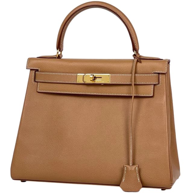 Hermès Kelly 28 Retourne 2-Way Handbag Courchevel Natural in Beige from The Reluxe, photo 1 of 1