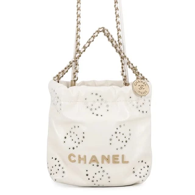 Chanel Handbag 22 Mini Perforated CC Logo Shiny Calf Leather 2-Way White in White Calfskin from The Reluxe, photo 1 of 1