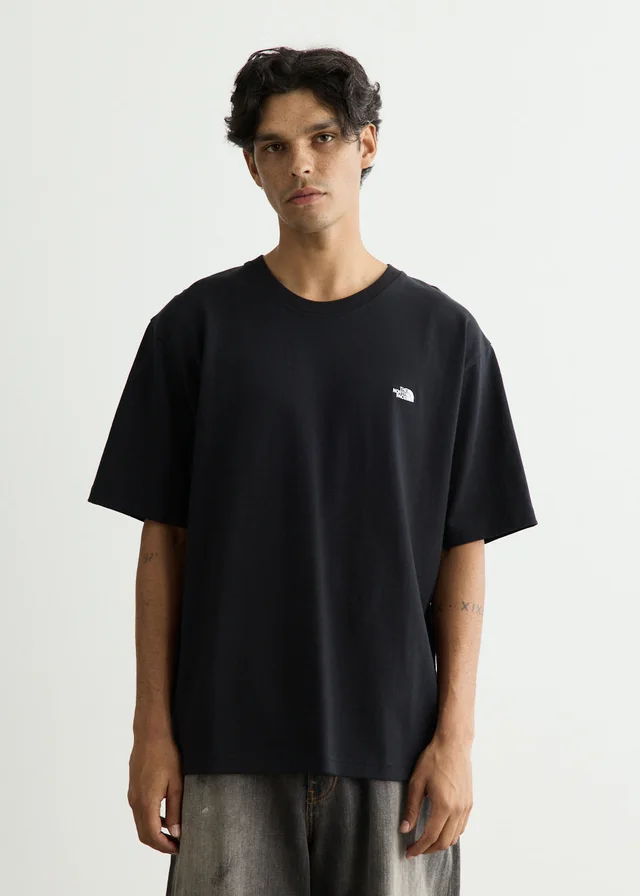 The North Face Ascend Through Ruins Short Sleeve Graphic T-Shirt in TNFBLK, image 1 of 1 from Incu