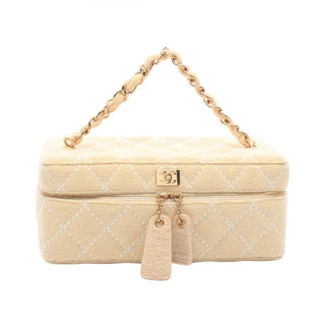 Chanel Handbag Wild Stitch Cream Canvas Quilted Chain Handle Vanity Bag in White Canvas from The Reluxe, photo 1 of 1