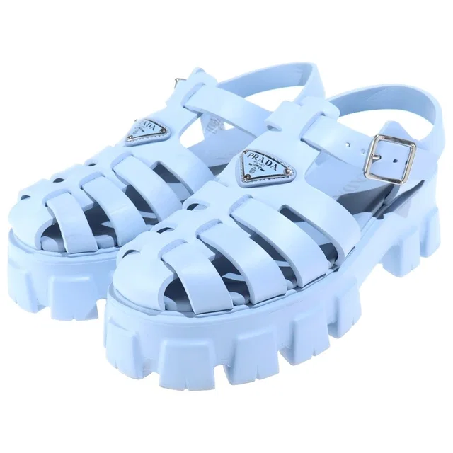 Prada Monolith Rubber Flat Sandals Triangle Logo Blue in Blue from The Reluxe, photo 1 of 1