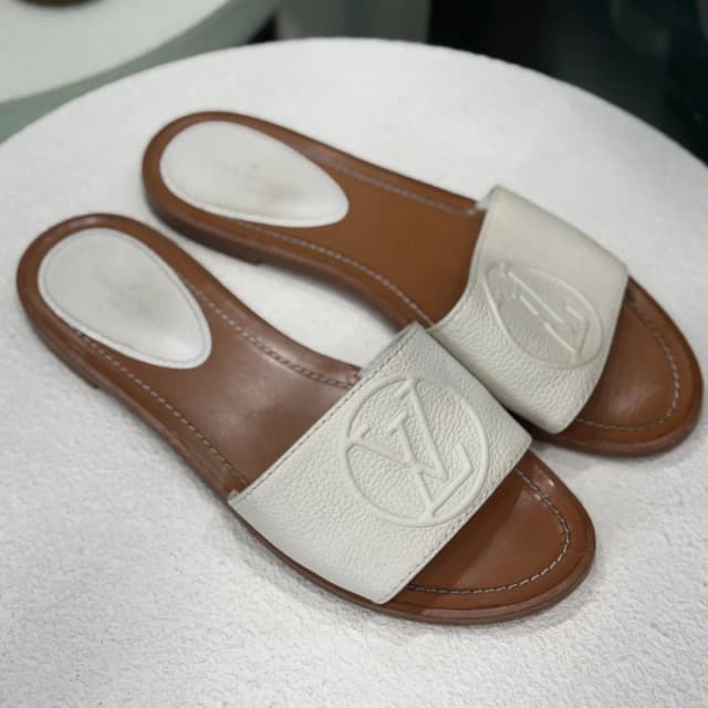 Louis Vuitton Lock It Leather Sandals Sz 38 in White Leather from Revivre Luxury Consignment, photo 1 of 1