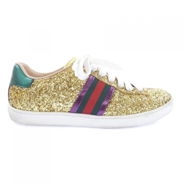 Gucci Sneakers Gold in Gold from The Reluxe, photo 1 of 1