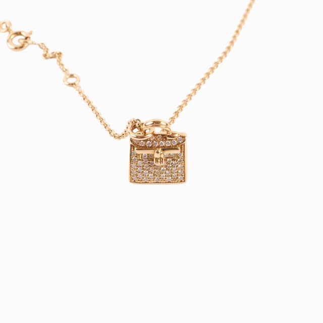 Hermès Kelly Amulette Necklace 18K Rose Gold in Pink from The Purse Affair, photo 1 of 1