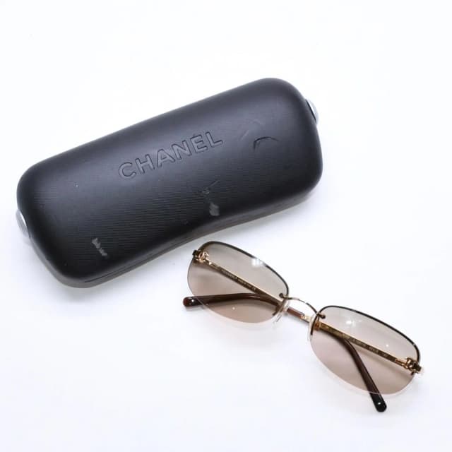 Chanel Rimless Sunglasses Side CC Logo Metal Brown Gold Eyewear in Brown from The Reluxe, photo 1 of 1