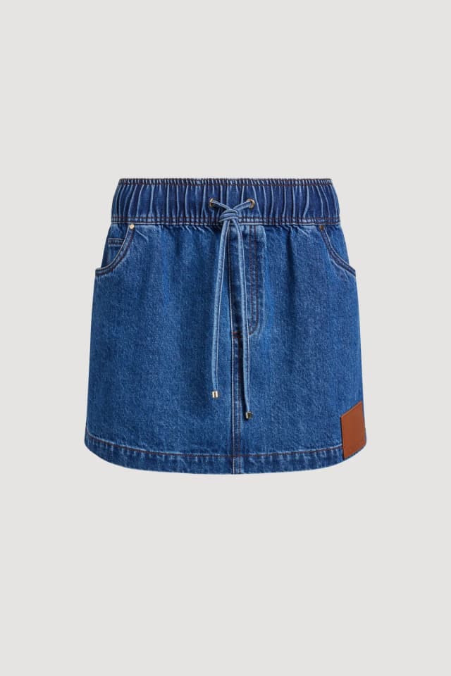 Aje Studio Flynn Denim Mini Skirt in RETRO WASH, image 1 of 1 from Aje