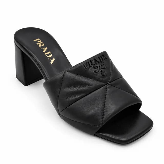 Prada Black Quilted Leather Logo Mules in Black Leather from Clotheshorse Anonymous, photo 1 of 1