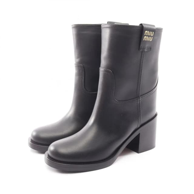 Miu Miu Boots Logo Leather in Leather from The Reluxe, photo 1 of 1
