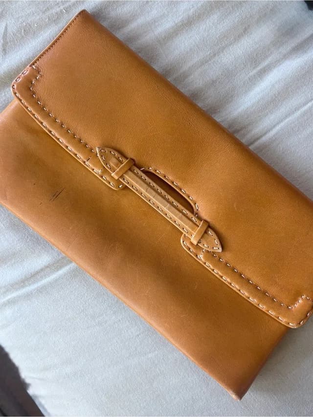 Delvaux Classic Tan Leather Clutch With Stitch-Trim Buckle Accent in brown|neutral Leather from Poshmark, photo 1 of 1