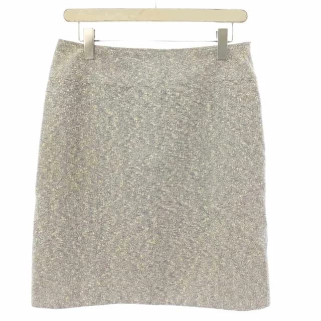 Chanel Boutique Tweed Skirt Knee-Length Ivory Navy 38 in White Tweed from The Reluxe, photo 1 of 1