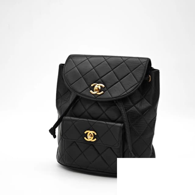 Chanel Quilted Backpack Flap Black Key in Black Leather from The Reluxe, photo 1 of 1