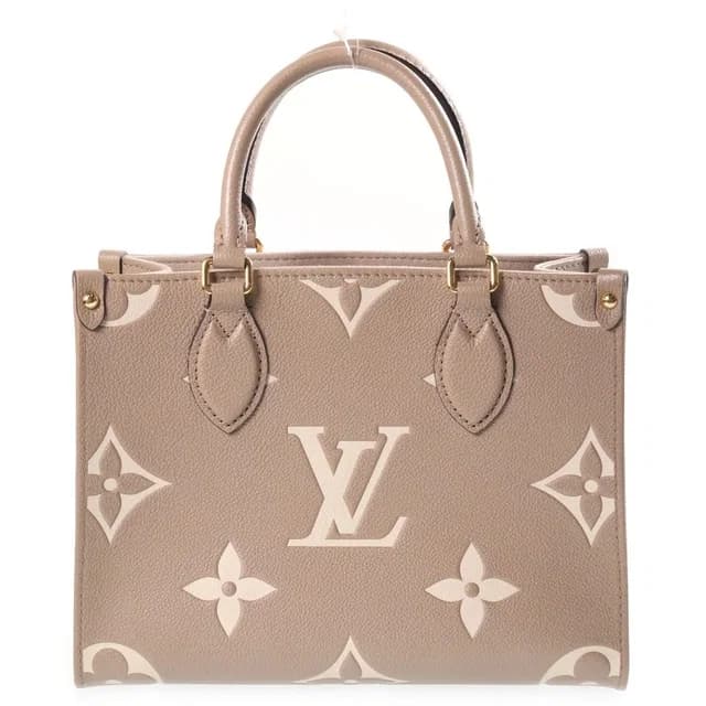 Louis Vuitton Monogram Giant Empreinte On The Go PM Tourterelle Cream 2-Way in White Leather from The Reluxe, photo 1 of 1