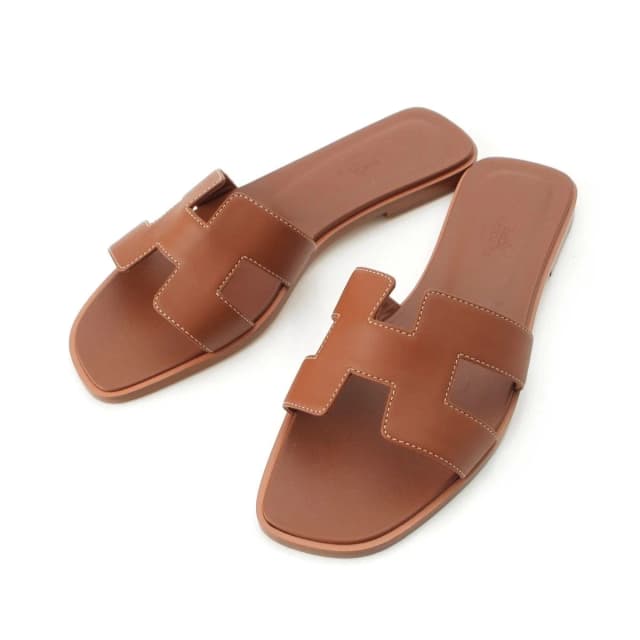 Hermès Oran Leather H Motif Flat Sandals Brown in Brown Leather from The Reluxe, photo 1 of 1