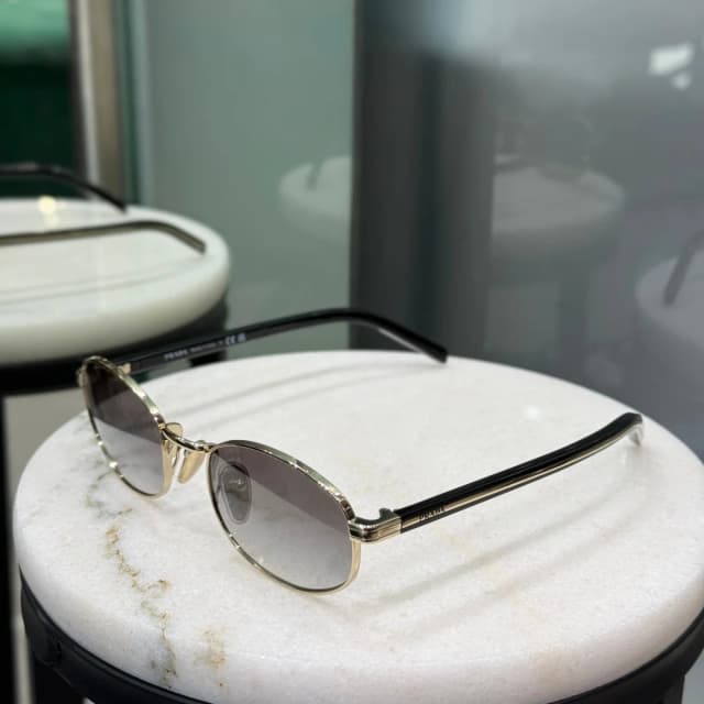 Prada Round Lens Sunglasses in Black from Revivre Luxury Consignment, photo 1 of 1