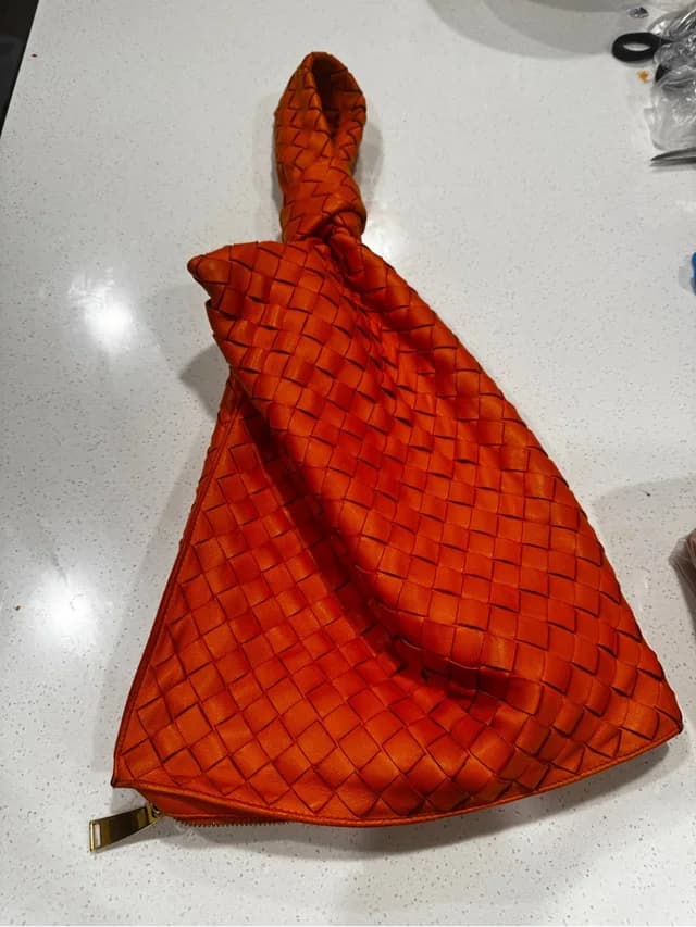 Bottega Veneta Zip Pouch in orange Leather from Poshmark, photo 1 of 1