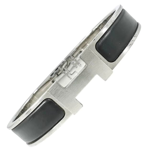 Hermès Clic H Silver Black Bangle Bracelet in Black from The Reluxe, photo 1 of 1