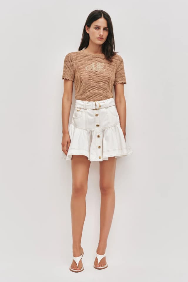 AJE Elena Belted Denim Mini Skirt in IVORY, image 1 of 1 from Aje