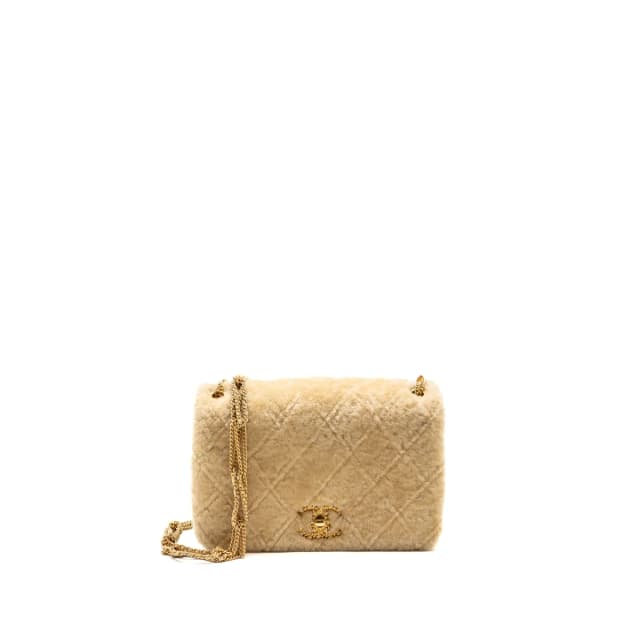 Chanel Shearling Quilted CC Logo Flap Bag in Beige Lambskin from EMIER, photo 1 of 1