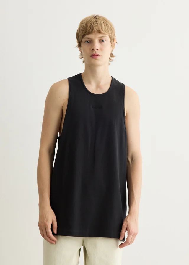 Fear of God Essentials Rib Tank in VINTAGE BLACK, image 1 of 1 from Incu