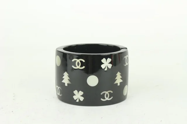 Chanel 05A Black Tree Clover CC Charm Cuff Bangle Bracelet in Black from Bagriculture, photo 1 of 1