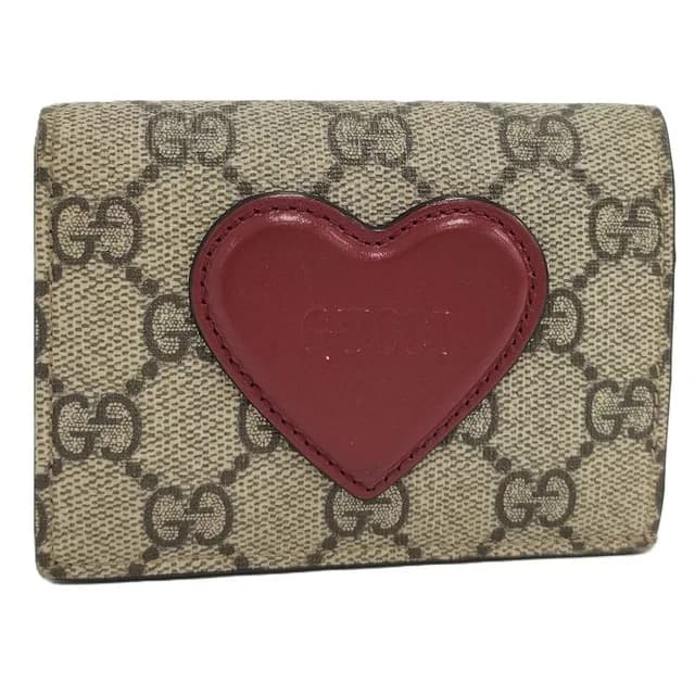 Gucci Heart Logo GG Supreme Bifold Wallet from The Reluxe, photo 1 of 1