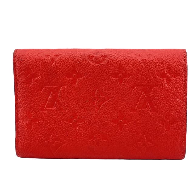 Louis Vuitton Portefeuille Curieuse Monogram Empreinte Red Trifold Wallet in Red from The Reluxe, photo 1 of 1