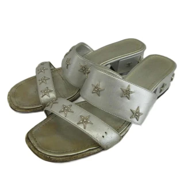 Chanel Sandals Leather Low Heels Star Studs Rhinestone CC Logo Silver in Silver Leather from The Reluxe, photo 1 of 1