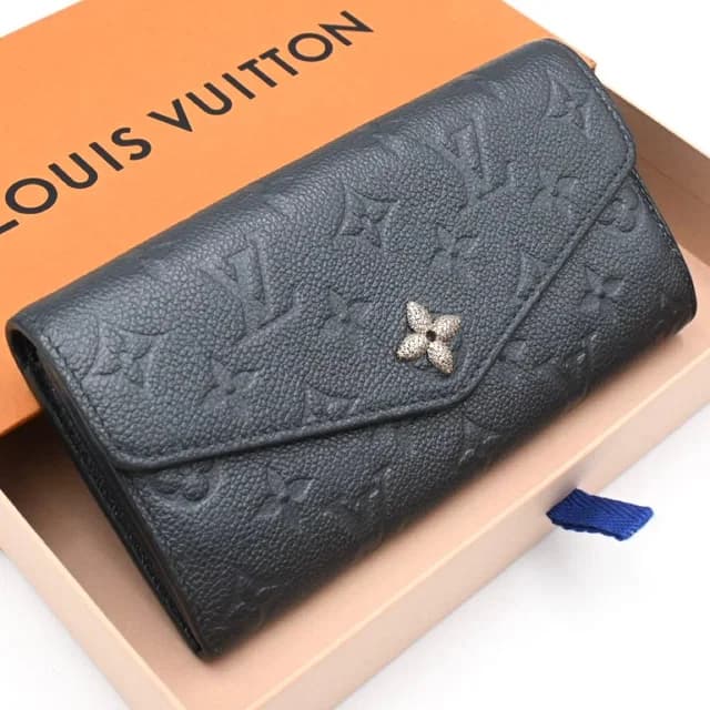 Louis Vuitton Empreinte Portefeuille Sarah Navy Limited Wallet in Navy Leather from The Reluxe, photo 1 of 1