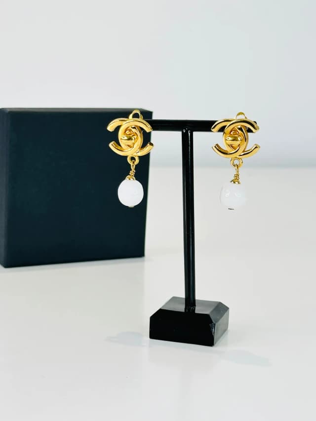 Chanel Gold Plated CC Turn Lock Clip-on Earrings in Gold from Edit Second Hand, photo 1 of 1