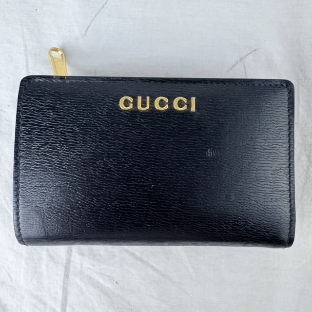 Gucci Script Bifold Black Leather Wallet in Black Leather, Metal from Reowned, photo 1 of 1