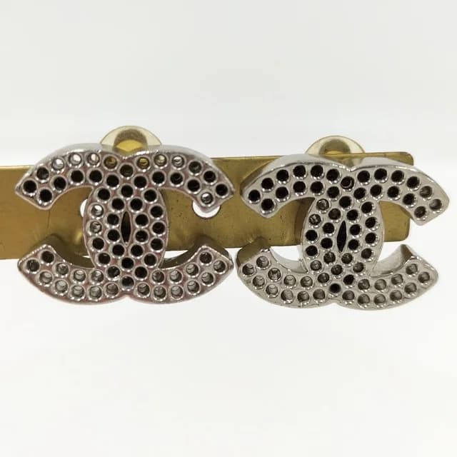 Chanel Earrings CC Logo Perforated Plated Silver in Silver from The Reluxe, photo 1 of 1