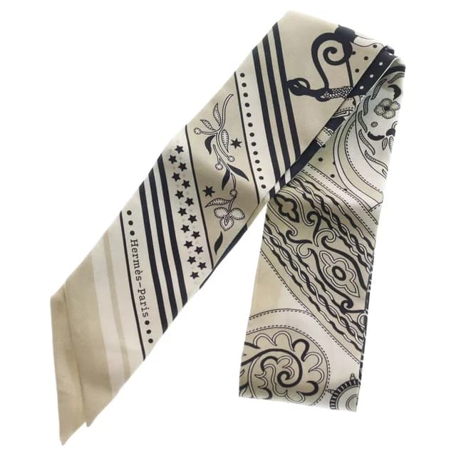 Hermès Twilly Festival Des Amazones Amazon Silk Scarf Ivory in White Silk from The Reluxe, photo 1 of 1