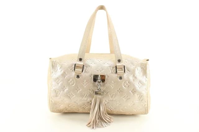Louis Vuitton Metallic Champagne Leather Monogram Comet Boston Bag in Leather from Bagriculture, photo 1 of 1