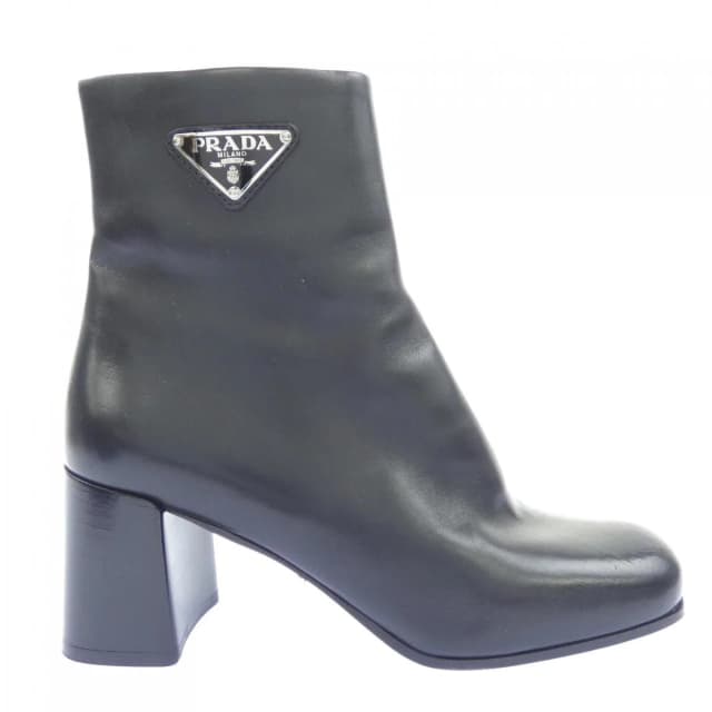 Prada Triangle Logo Boots in Calfskin from The Reluxe, photo 1 of 1