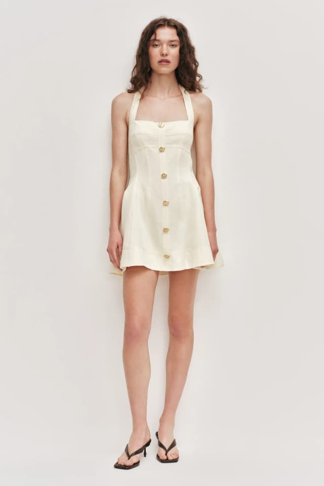 AJE Monroe Halter Mini Dress in BUTTER, image 1 of 1 from Aje