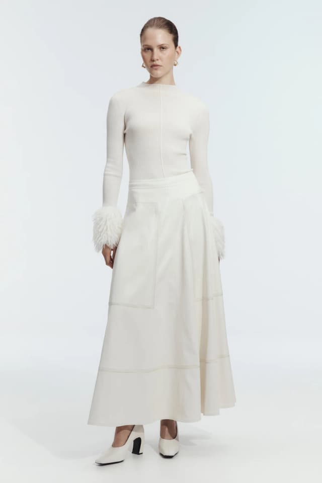 AJE Lotus Vegan Leather Midi Skirt in IVORY, image 1 of 1 from Aje