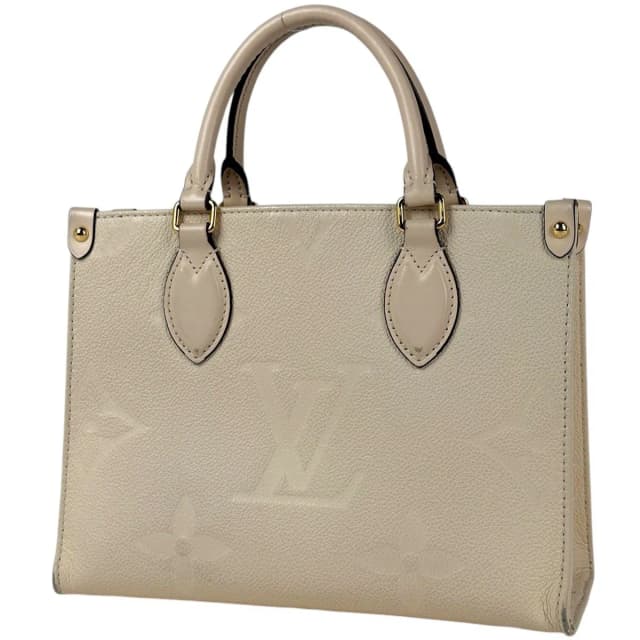 Louis Vuitton On The Go PM Handle 2-Way Monogram Empreinte Cream Tote Bag in White from The Reluxe, photo 1 of 1