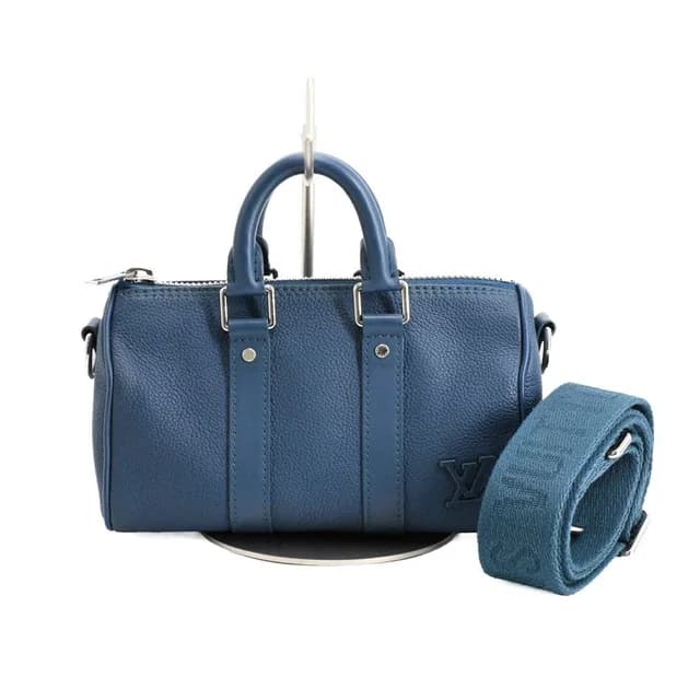 Louis Vuitton Shoulder Bag Keepall XS in Leather from The Reluxe, photo 1 of 1