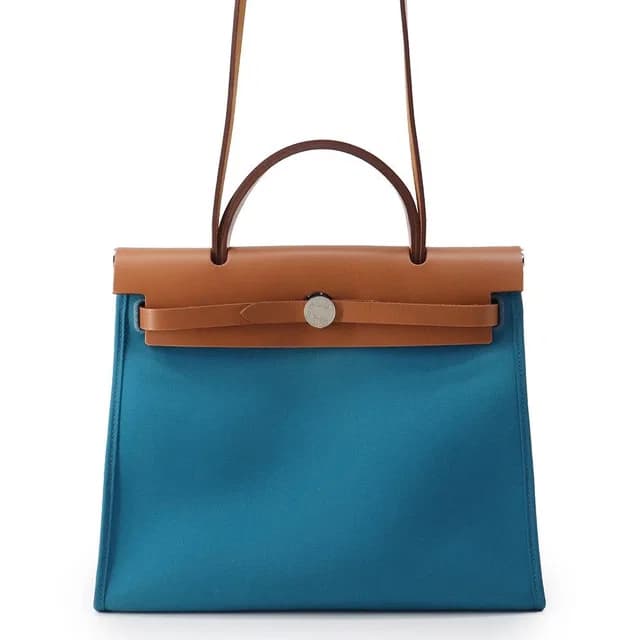 Hermès Herbag Zip PM Blue Dogalis Fauve Silver Toile Officier Vache Hunter in Blue from The Reluxe, photo 1 of 1
