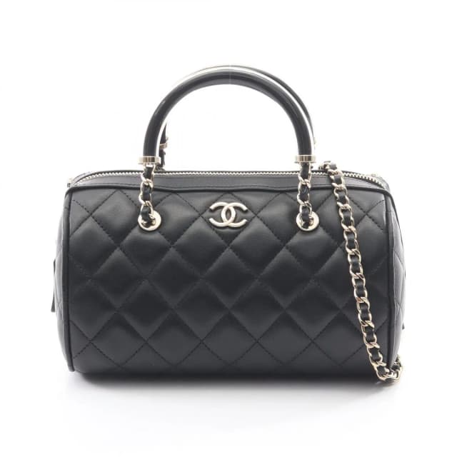 Chanel Quilted 2-Way Black Lambskin Mini Boston Bag in Black Lambskin from The Reluxe, photo 1 of 1
