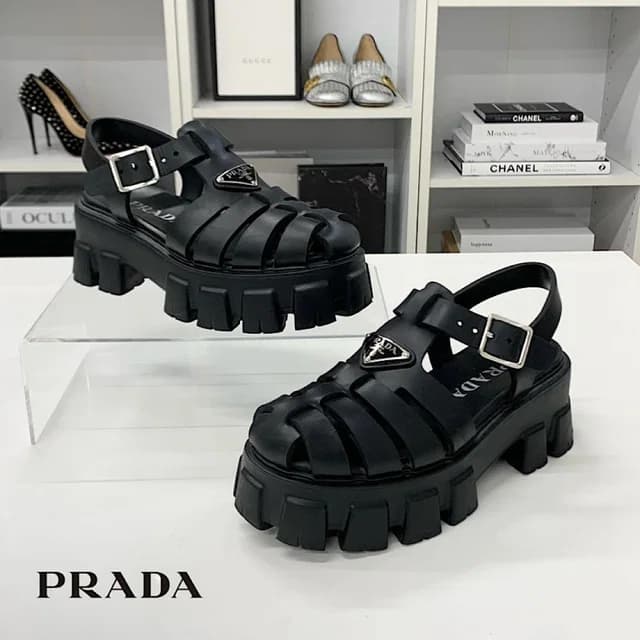 Prada Monolith Rubber Triangle Logo Sandals Black in Black from The Reluxe, photo 1 of 1