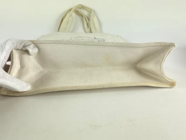 Chanel Off-White CC Logo Shopper Tote in White Canvas from Bagriculture, photo 1 of 1