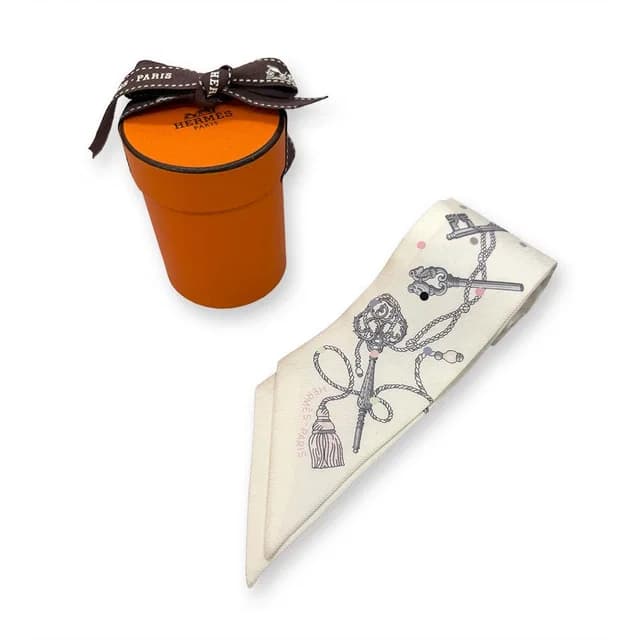Hermès Cles Pore Twilly Scarf in Silk from The Reluxe, photo 1 of 1