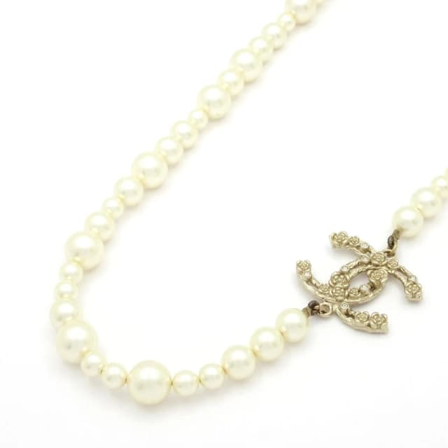 Chanel Necklace CC Logo Ivory Gold Clear Camellia in White from The Reluxe, photo 1 of 1