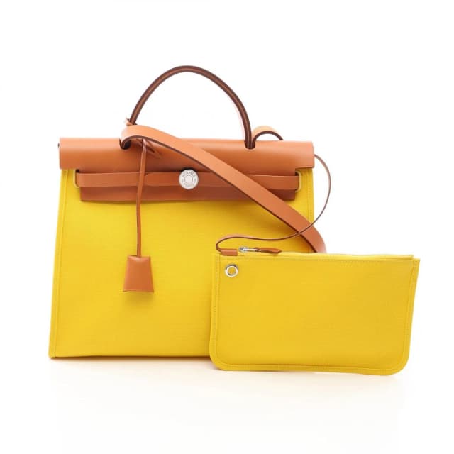 Hermès Handbag Herbag Zip PM 2-Way Jaune Naple Natural Canvas Leather in Beige Canvas from The Reluxe, photo 1 of 1